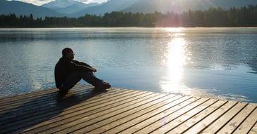 man enjoying the sunset