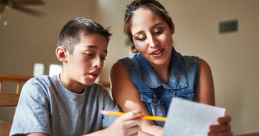 mother and child reviewing IEP and school success plan