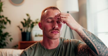 man in therapy using tapping and bilateral stimulation in EMDR