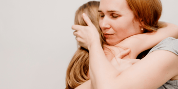 mother comforting her child