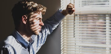 man beside the window