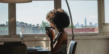 woman enjoying her coffee