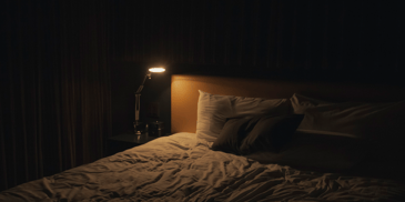 bed with lights turned off