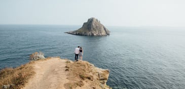 Couple dating beside the coast