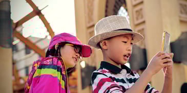 children watching phone