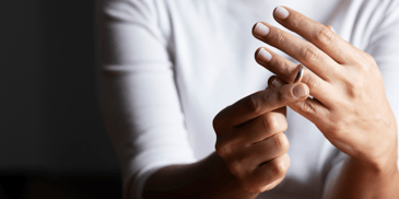 Person removing a ring