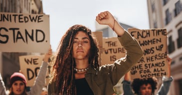 young lady in the street rallying