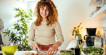 woman prepping meals for healthy mind body connection