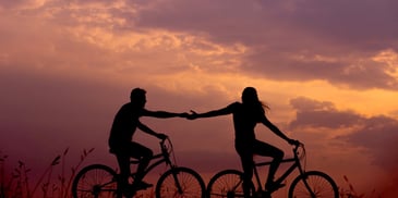 couple with different bicycles