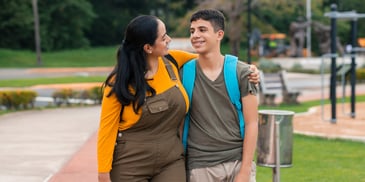 patient mom encouraging and guiding teen son 