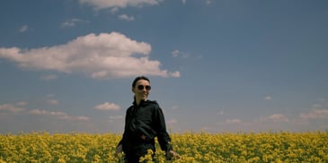 Person standing in field.