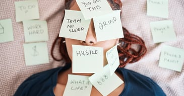 negative thought and work stress post it notes on close up woman's face